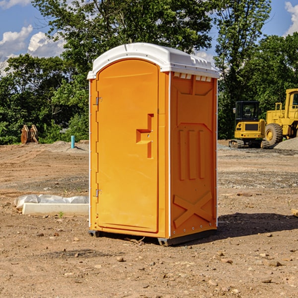 what is the cost difference between standard and deluxe porta potty rentals in Middleport